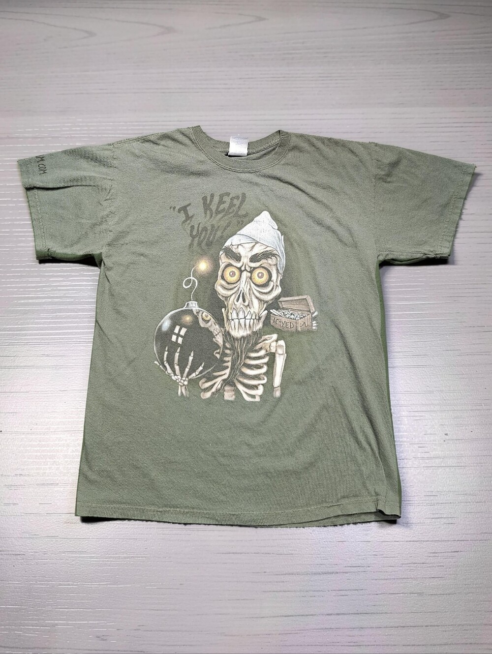 ACHMED THE DEAD TERRORIST Graphic Skeleton Bomb Tee in Sage Green. Size M.